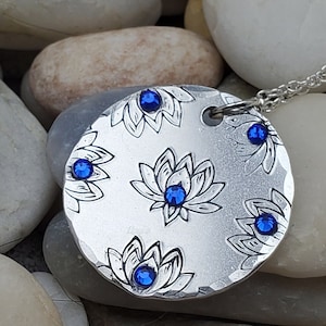 Blue lotus hand stamped necklace