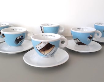 Collezione Illy Art BAR 2001 'International Flight' di Norma J. - Set completo di 6 tazze da cappuccino con piattini