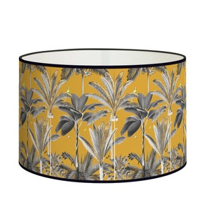 Black and white palm tree lampshade on yellow background - Vibrant contrast for a vintage look