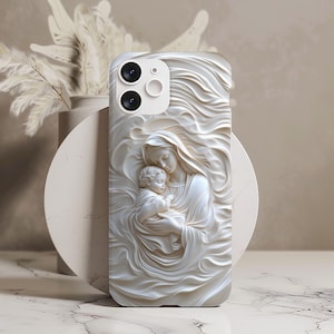 3D-style phone case featuring a beige carved-look design of the Virgin Mary gently holding baby Jesus, with intricate detailing and a sculpted texture effect.