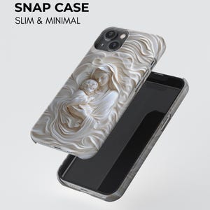 A snap case with a slim and minimal design. The case features a detailed relief sculpture of a mother and child.