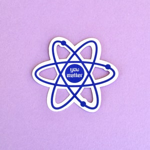May include: White sticker with a blue atomic symbol and the text "You Matter" in the center.
