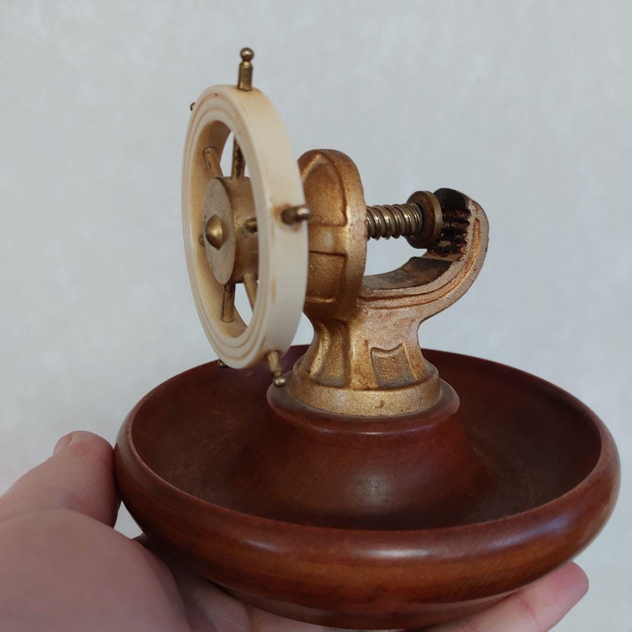 Mid Century Ships Wheel Nut Cracker With Wooden Base - Brass and