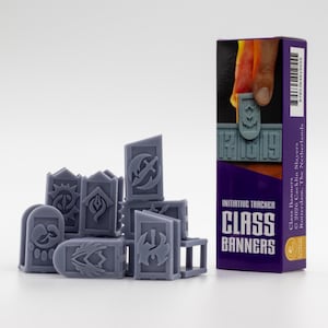 May include: A set of grey resin initiative tracker class banners with various embossed symbols, accompanied by a purple and black rectangular box labeled Class Banners Initiative Tracker 2026 Cacklin Slayers Rotterdam, The Netherlands.