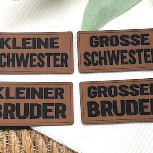 Lederlabel: kleiner Bruder, grosser Bruder, kleine Schwester, grosse Schwester