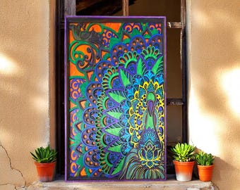 May include: A vibrant, hand-carved wooden peacock art piece. The artwork features a peacock design with intricate details in shades of green, blue, purple, and yellow against an orange background, framed in purple. The piece is displayed on a windowsill.