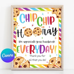 May include: A framed print with a light wood-colored frame. The print features the words "CHIP CHIP HOORAY" in colorful letters, with cookie illustrations. The text "We appreciate your hardwork EVERYDAY!" and "Thank you for all that you do!" are also included.