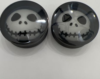 28mm black surgical steel ear plugs with Jack Skelington.