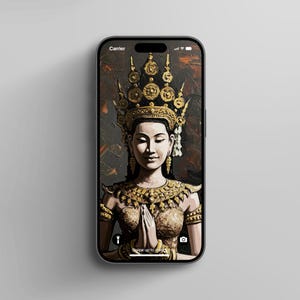 May include: A woman wearing a gold crown and traditional clothing with her hands clasped in prayer. The background is a dark brown with a textured look.