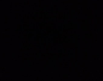 Puede incluir: Un fondo negro.