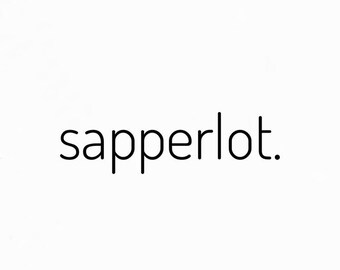 May include: Black and white text that reads "sapperlot."