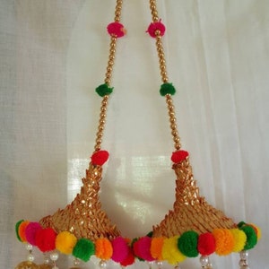 Designer indian lehengas tassels blouse tassels for Designer clothes