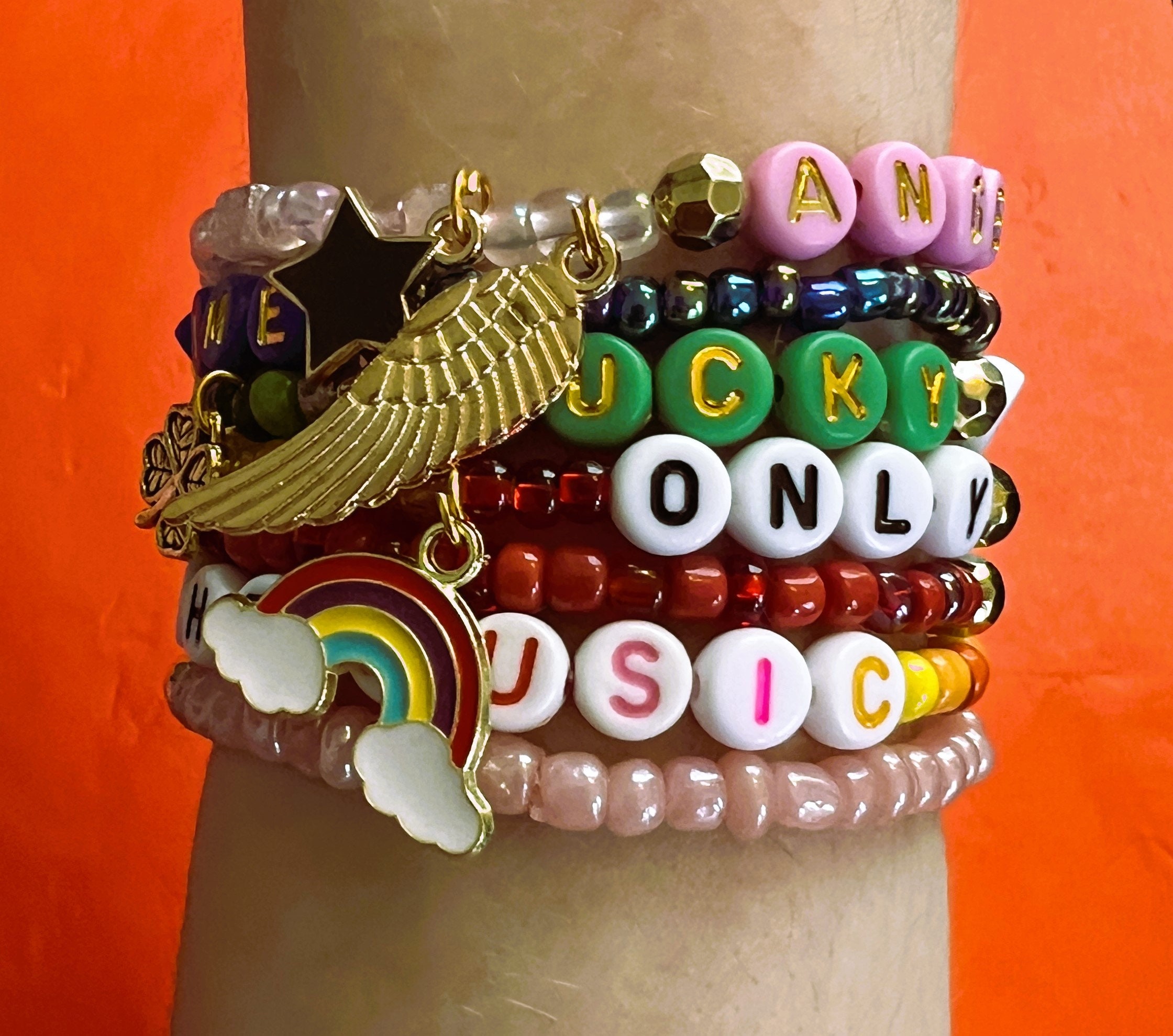 louis tomlinson charm bracelet｜TikTok Search