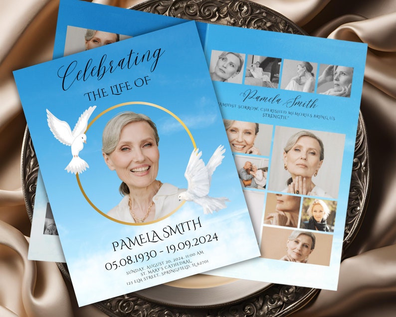 Pu&ograve; includere: Un biglietto commemorativo blu e oro con una foto di una donna e colombe. Il testo recita "Celebrating the Life of Pamela Smith 05.08.1930 - 19.09.2024".