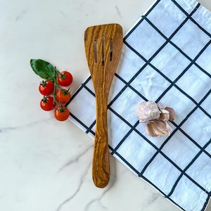Olive wood spatula with grooves, handmade kitchen helper 30 cm