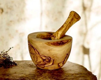 Rustic mortar for spices and herbs made of olive wood