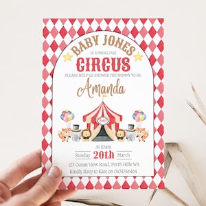 May include: A red and white checkered baby shower invitation with a circus theme. The invitation says "Baby Jones is joining our Circus" and "Please help us shower the mummy to be Amanda". The invitation also includes a cartoon image of a circus tent with animals.