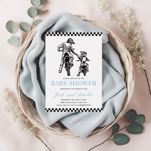 May include: A black and white illustration of two people riding dirt bikes. The text on the invitation reads "Please join us for the Baby Shower honoring the parents to be Josh and Amelia. Saturday 13th June at 2PM 345 Lagoon Drive, Perth WA Kindly RSVP to Pippa on 0435627272"