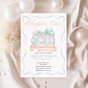 May include: A light blue and pink invitation with a stack of books tied with a blue ribbon and a pearl necklace. The invitation says "Chapter One" and "Oakley Grace turning one". The invitation includes the date, time, address, and RSVP information.