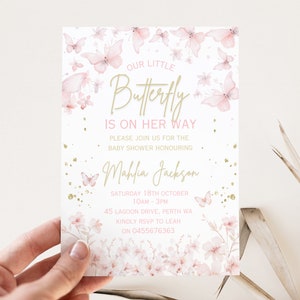 May include: Pink and gold baby shower invitation with a butterfly design. The text reads "Our Little Butterfly is on her way." The invitation includes the date, time, and location of the shower.