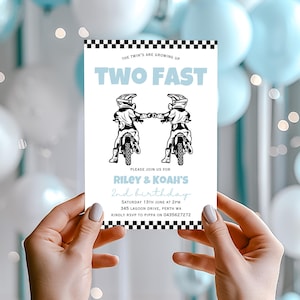 May include: A white invitation with black and white checkered borders. The invitation is for Riley and Koah's 2nd birthday. The invitation features a graphic of two children riding dirt bikes. The text "Two Fast" is in blue letters.