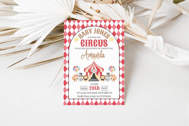May include: A red and white checkered baby shower invitation with a circus theme. The invitation says "Baby Jones is joining our Circus" and "Please help us shower the mummy to be Amanda". The invitation also includes a cartoon image of a circus tent with animals and balloons.