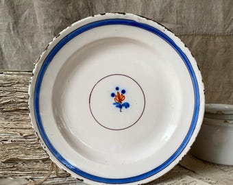Antique French 18th century earthenware plate.