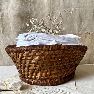 Antique French woven straw basket, French countryside. Campaign basket