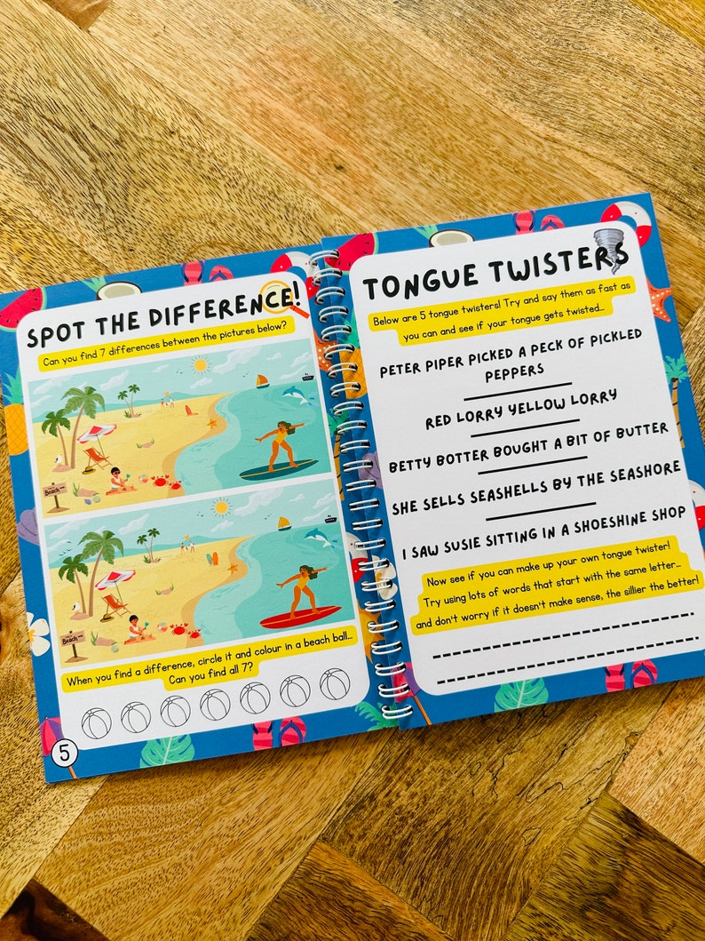 May include: A colorful children's activity book with a spot the difference game on the left page and tongue twisters on the right page. The left page features a beach scene with palm trees, an umbrella, and people. The right page features a blue background with white text.