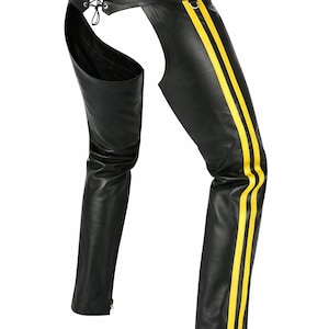 May include: Black leather chaps with yellow racing stripes. The chaps feature a lace-up back and a cutout design. The legs have a zipper at the bottom.