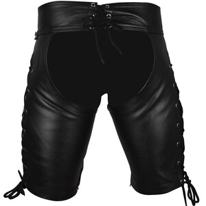 May include: Black leather chaps with a lace-up waist and sides. The chaps have a cutout design in the back and are knee-length. The sides feature grommets and laces for adjustable fit. A classic biker style.
