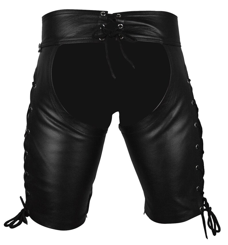 May include: Black leather chaps with a lace-up waist and sides. The chaps have a cutout design in the back and are knee-length. The sides feature grommets and laces for adjustable fit. A classic biker style.