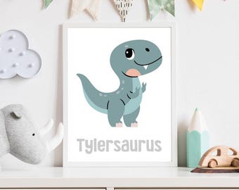 May include: A white framed print with a light blue dinosaur illustration and the text "Tylersaurus".