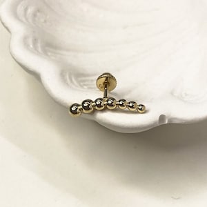 Piercing hélice barre incurvée en or massif 14 carats : conque, daith, tour