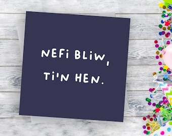 May include: A dark blue card with white text that reads "NEFI BLIW, TI'N HEN."