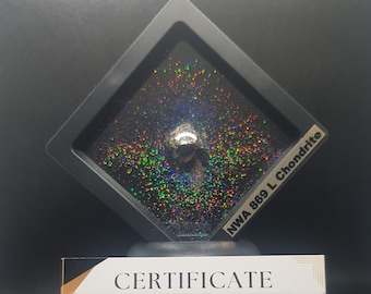 Genuine meteorite space rock in night sky effect holographic black display box art gift collectible with Certificate of Authenticity.