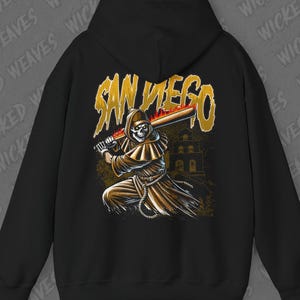 May include: Black hooded sweatshirt with a graphic print of a skeleton holding a baseball bat with flames. The text "San Diego" is printed in yellow above the graphic.