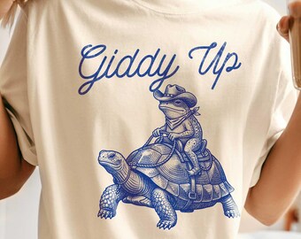 Cowboy Frog Riding Tortoise Graphic Tee: Hippie Western Country Shirt (Cowboy Sarcasm)