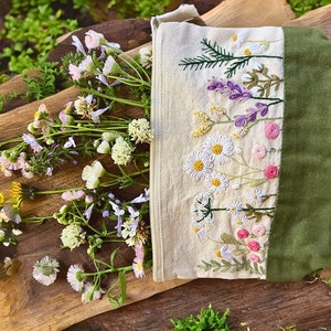 Hand embroidered zippered pouch