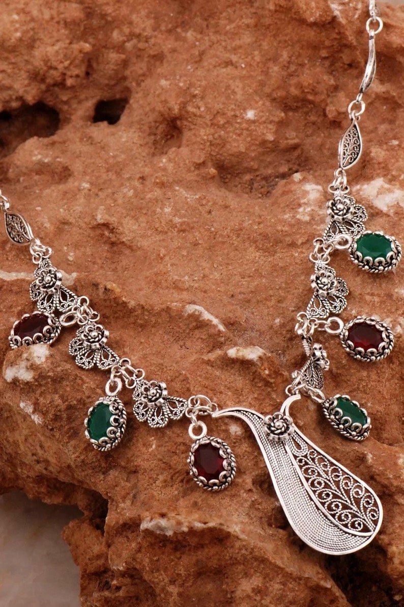Handcrafted filigree silver necklace with emerald and ruby stones