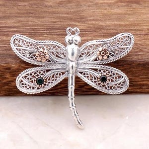 Sterling Silver Dragonfly Brooch with Bronze Dot Wings and Green Gem Accents for Nature Inspired Elegant Vintage Jewelry Look
