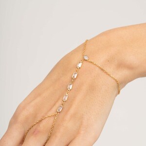 Gold‑plated sterling silver Shahmeran bracelet featuring intricate filigree and sparkling cubic zirconia stones.