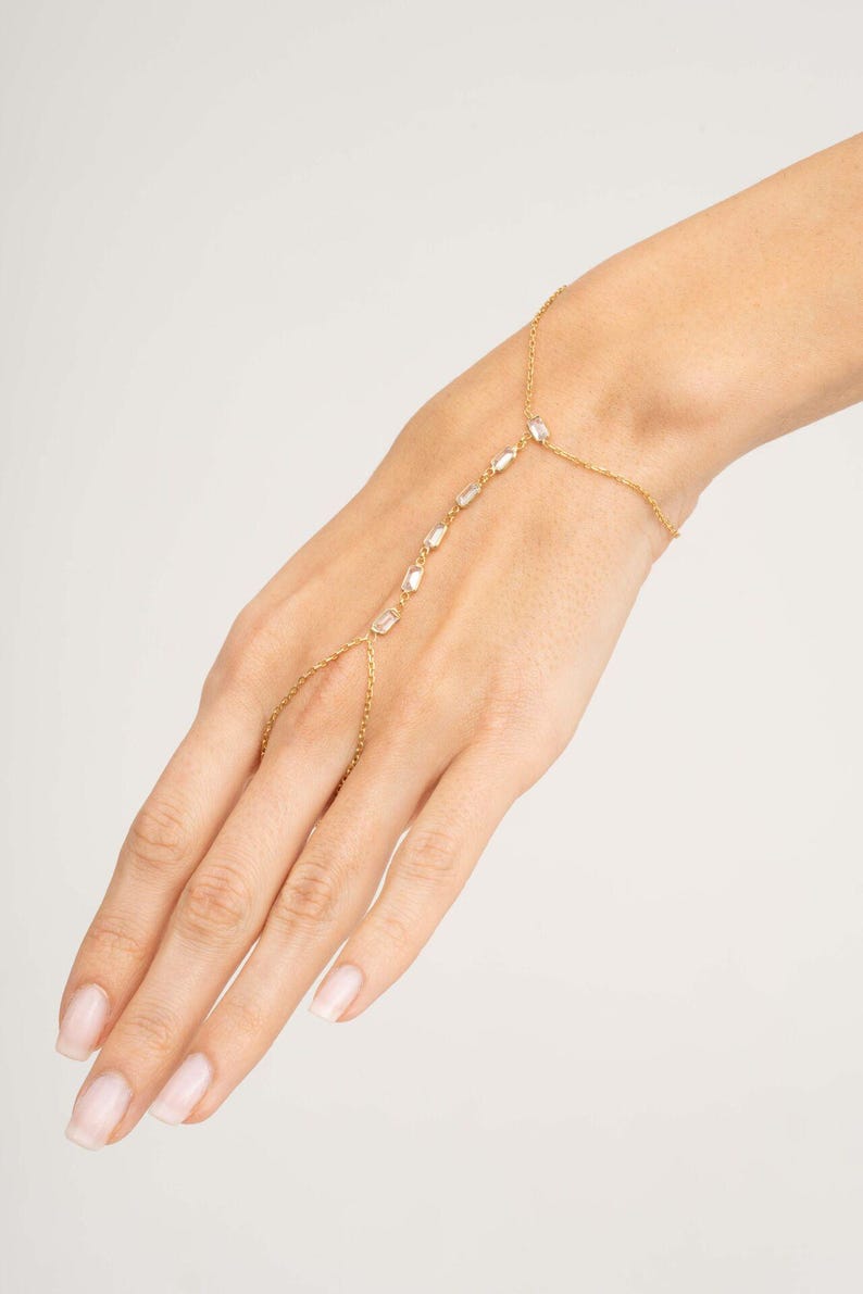 Gold‑plated sterling silver Shahmeran bracelet featuring intricate filigree and sparkling cubic zirconia stones.