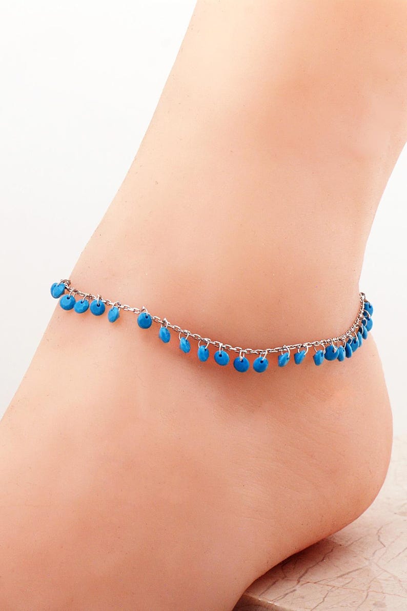 Handmade turquoise pendant chain made of 925 sterling silver with a gold‑plated rhodium finish, measuring 21.5 cm with 4.5 cm extenders.