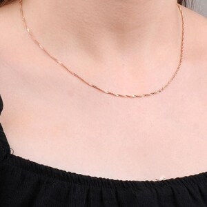 A 45 cm long rose gold finish chain made of 925 sterling silver, displayed flat with smooth cable links.