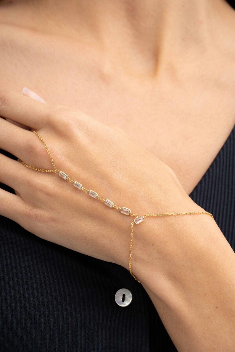 Gold‑plated sterling silver Shahmeran bracelet featuring intricate filigree and sparkling cubic zirconia stones.