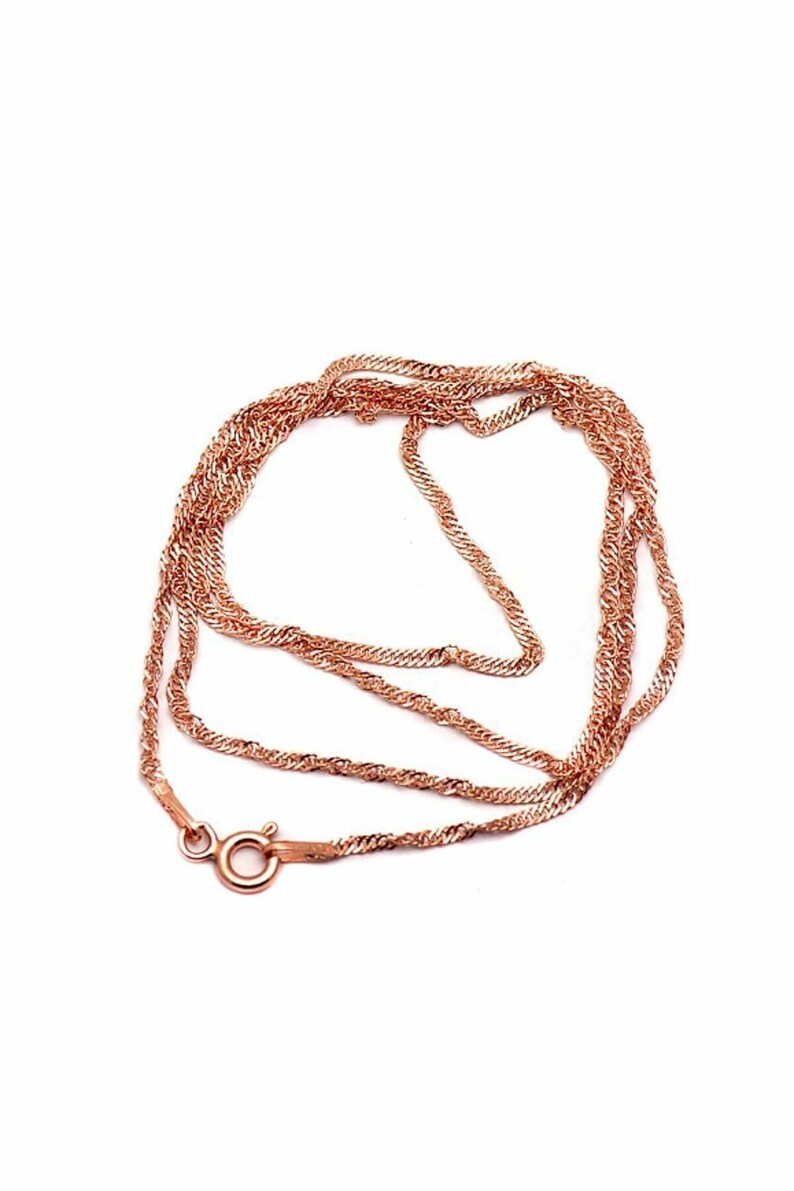 A 45 cm long rose gold finish chain made of 925 sterling silver, displayed flat with smooth cable links.
