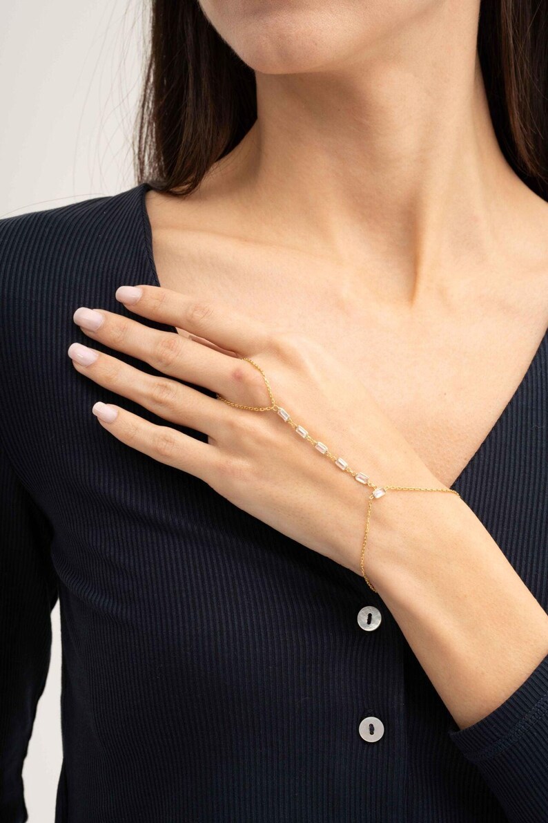 Gold‑plated sterling silver Shahmeran bracelet featuring intricate filigree and sparkling cubic zirconia stones.