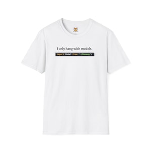 May include: White t-shirt featuring the text "I only hang with models." and a line of code: "import Model from './Runway';". The shirt has a small logo on the upper center.