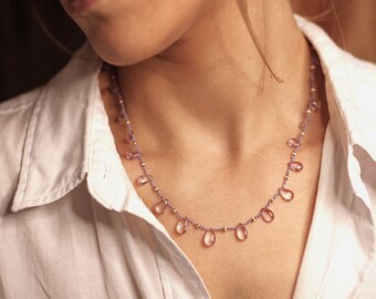 Hand-knotted smooth briolette amethyst necklace on silk thread
